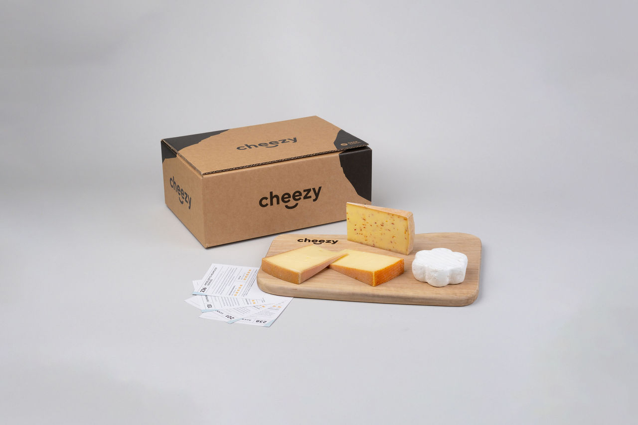 a cheezy delivery box and cheese a cheezy delivery box and cheese
